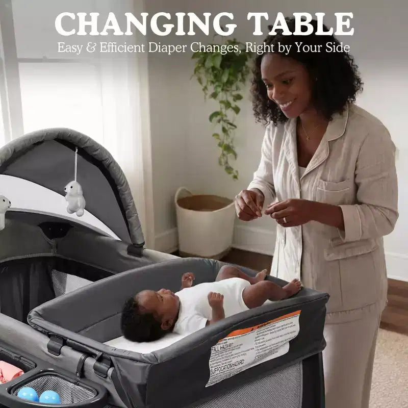 4-in-1 Portable Pack 'n Play with Bassinet, Changing Table, Adjustable Canopy, Storage Basket & Travel Bag
